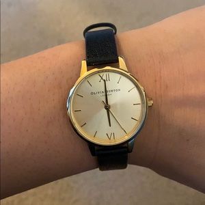 Olivia Burton gold face / black leather band